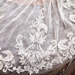 A luxurious one-shoulder mermaid wedding dress open back with a detachable shoulder cape - OU-F1007